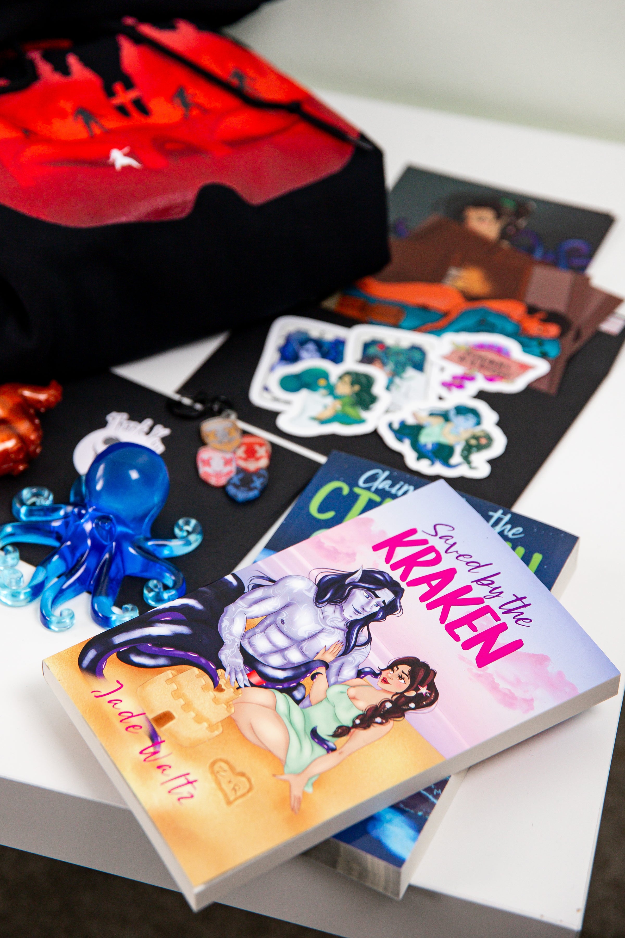 SteamyBookworms book box featuring Saved by a Kraken by Jade Waltz and stickers—monster romance book lover's bundle.